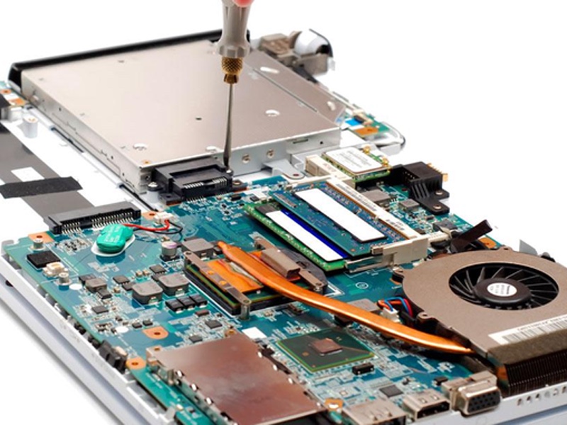 Laptop mainboard being repaired